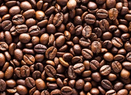 Roasted coffee beans, illustrating the caffeine row of the panel